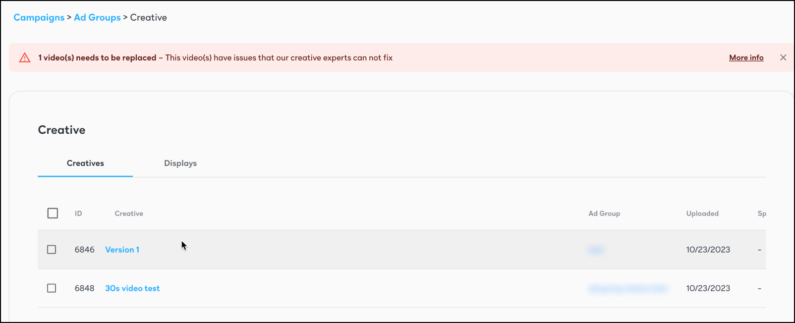 Screenshot of the Creative list showing alerts for creatives with issues.